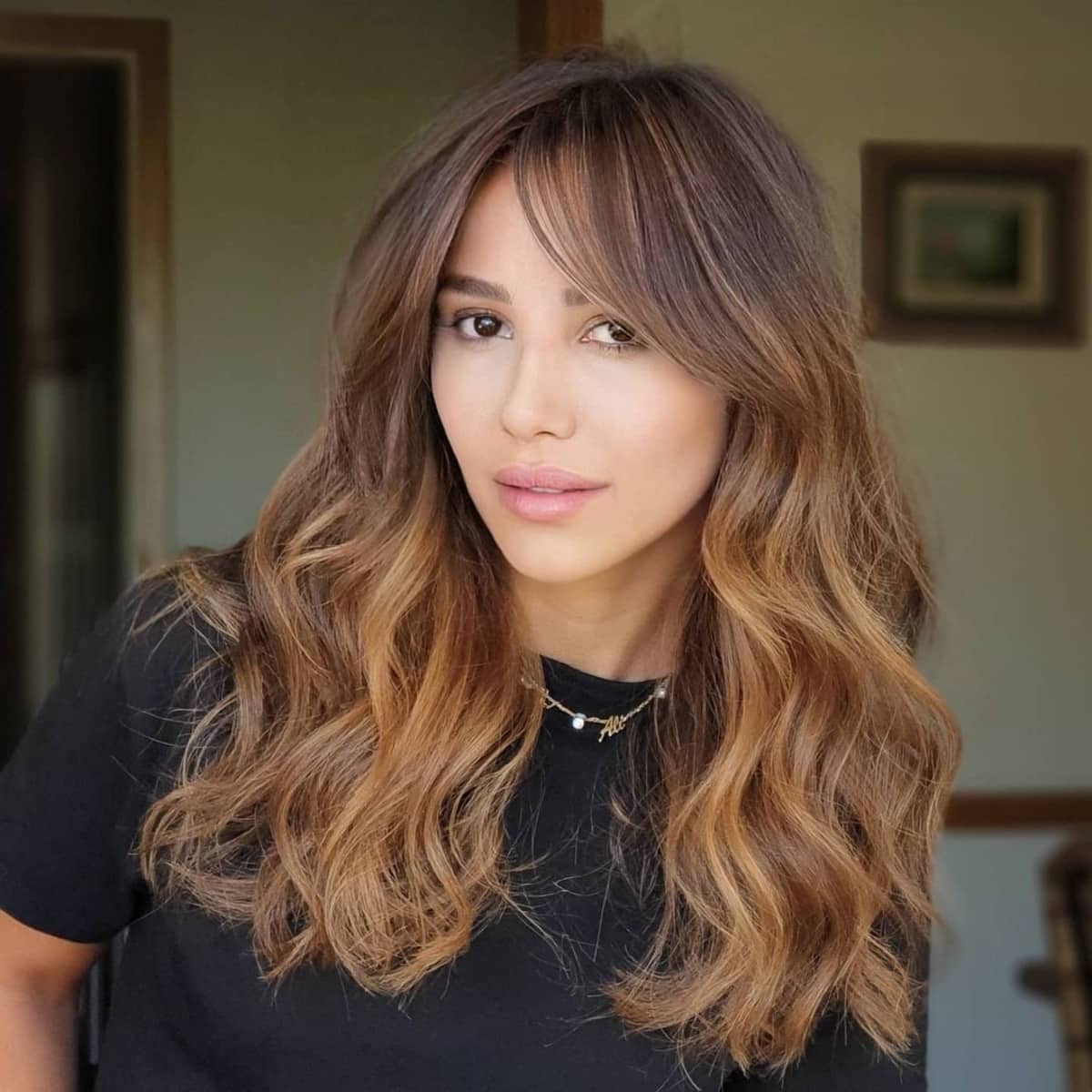 bangs hairstyle for round face to look slim